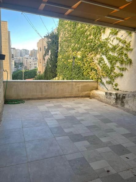 180m² Semi-Ground Floor Apartment in Khalda, Amman