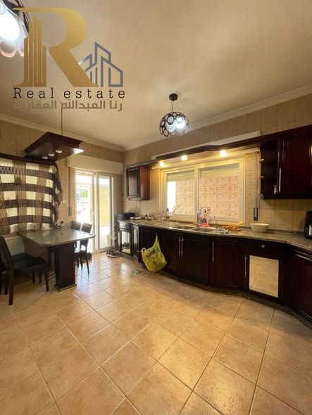 4-Bedroom Semi-Ground Floor Apartment in Tla' al-Ali, Amman