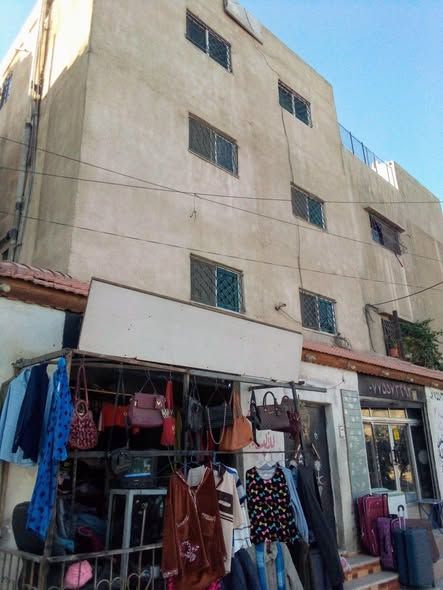 4-Story Building – Apartments & 2 Commercial Shops