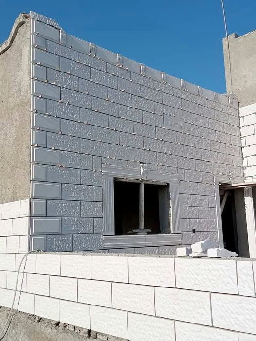 تركيب حجر صناعي شامل المواد